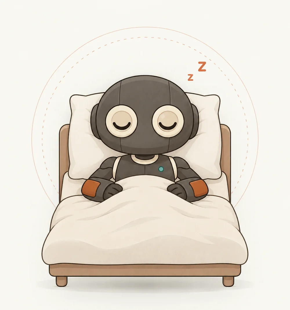 LOCK asleep in bed under a cream blanket